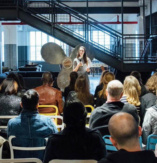Liz Long delivering a talk about launching a physical product
